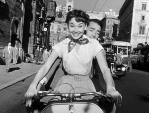 0c1fc-audrey_hepburn_and_gregory_peck_on_vespa_in_roman_holiday_trailer