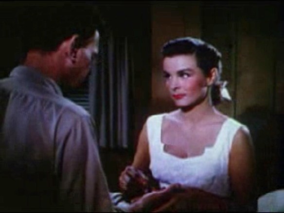 Jean_Peters_mends_Joseph_Cotten's_hand_in_Niagara_trailer_1